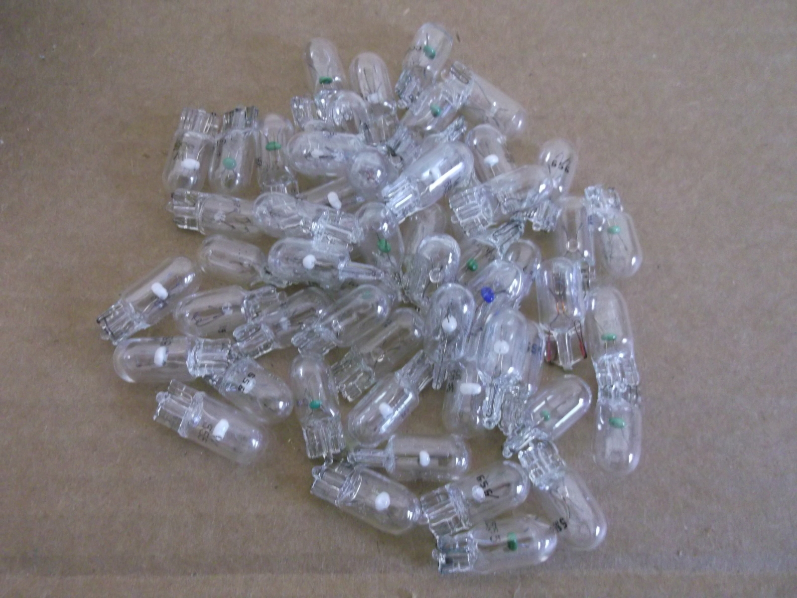 Bulk Box Of 100 NOS 194 Pinball Machine Mini Wedge Incandescent Bulbs - Jurassic Classic